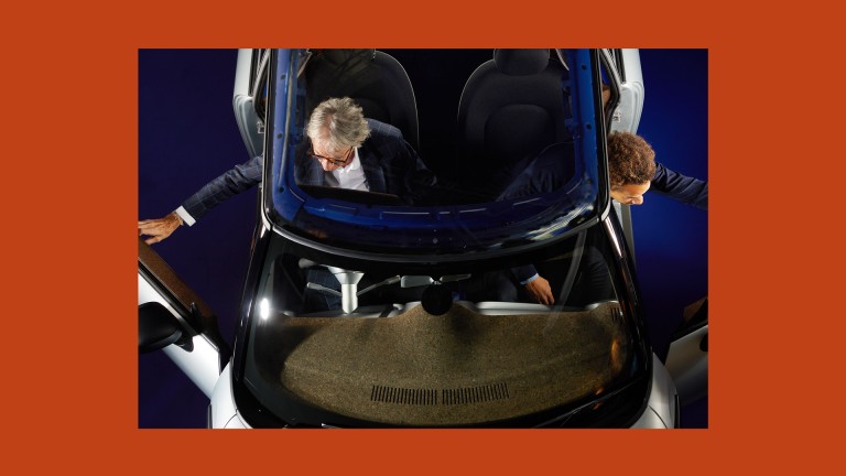 A look into the car from above. The roof is open and Smith (left) and Heilmer (right) are getting into the MINI Strip.